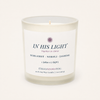 A frosted glass soy wax candle with a white label reading 'IN HIS LIGHT' and 'Bergamot - Neroli - Jasmine' by iTrulyAdornYou, photographed on a clean off-white background.