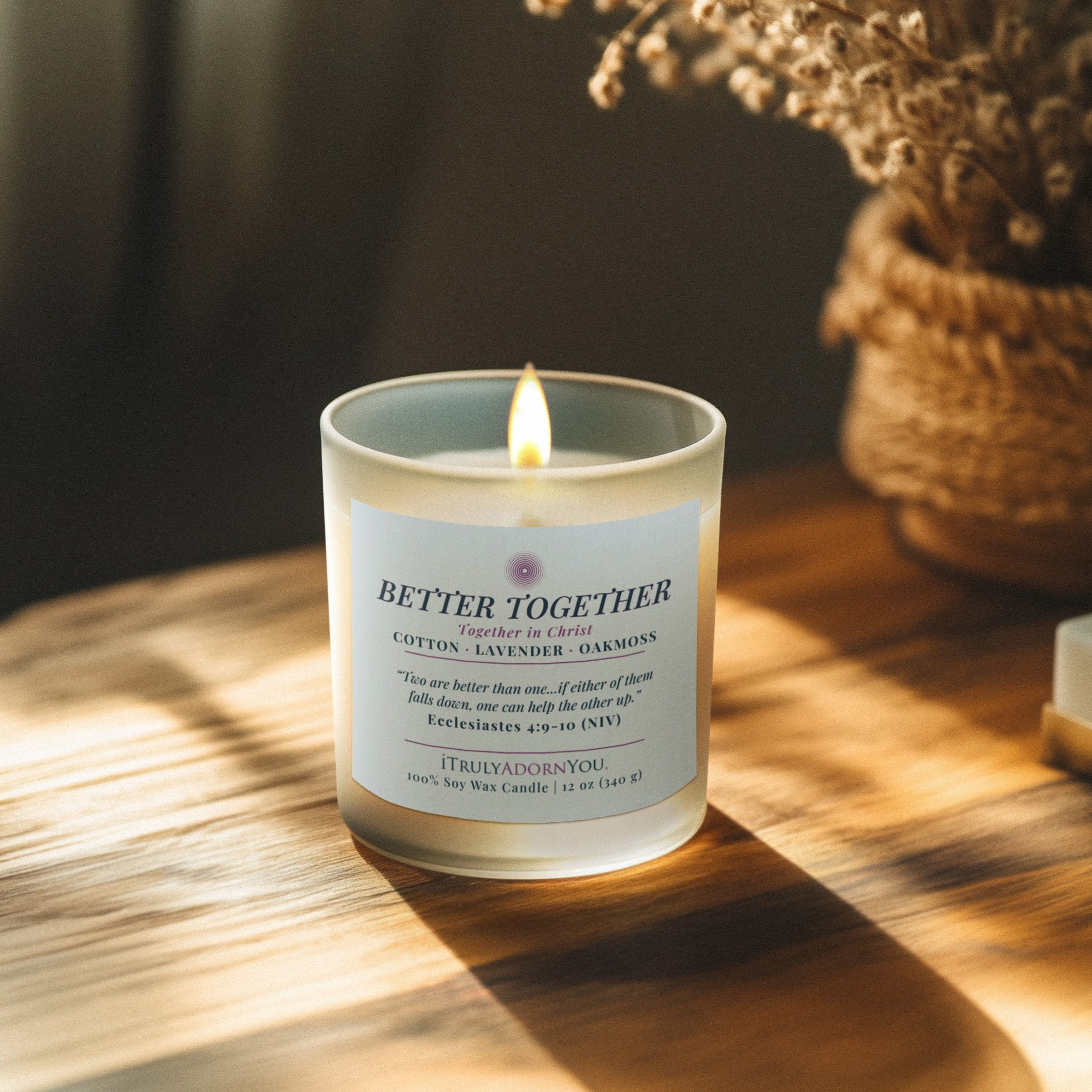 Better Together candle with a sky blue label a wooden surface with a blurred background